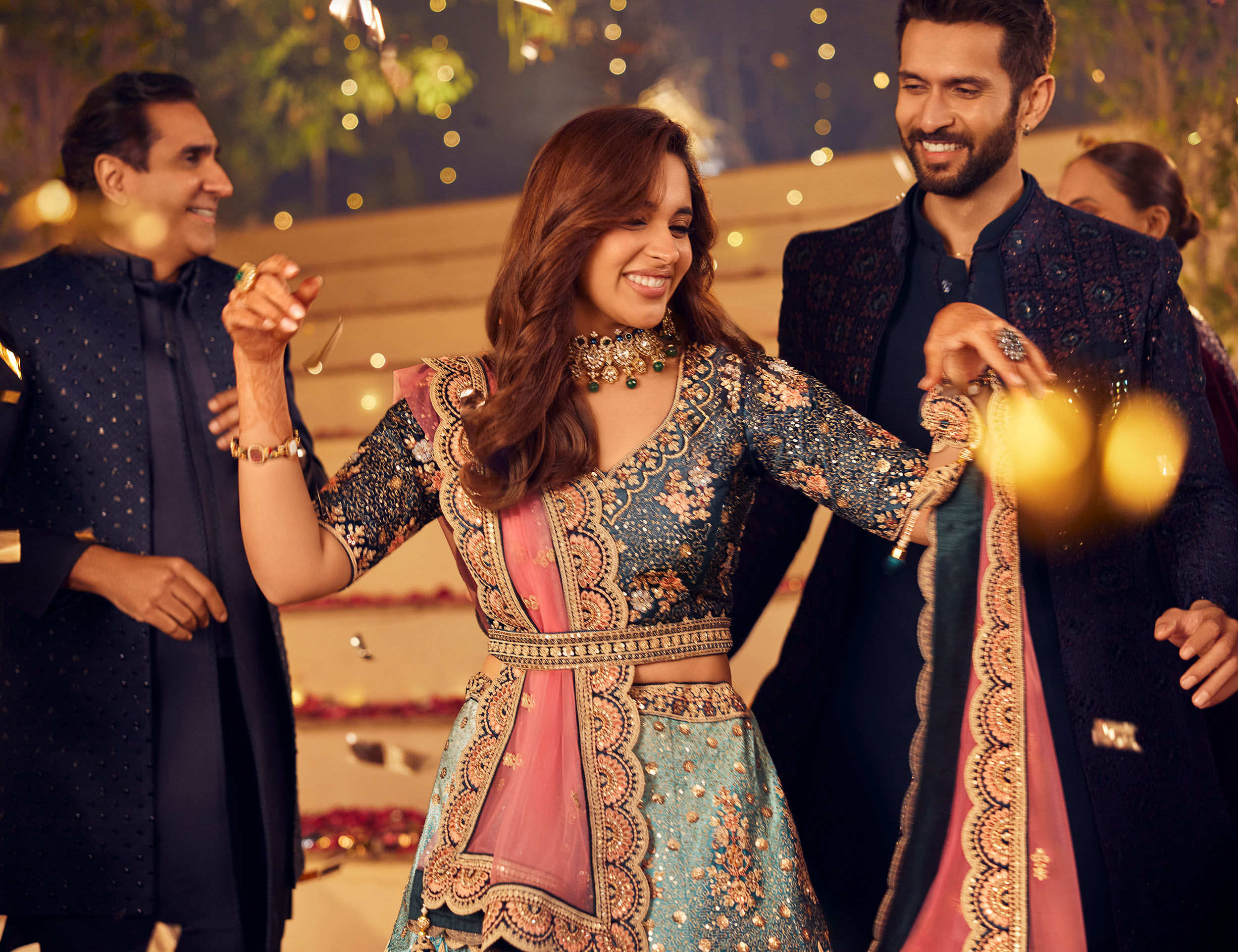 Bride dancing joyfully with friends at her wedding